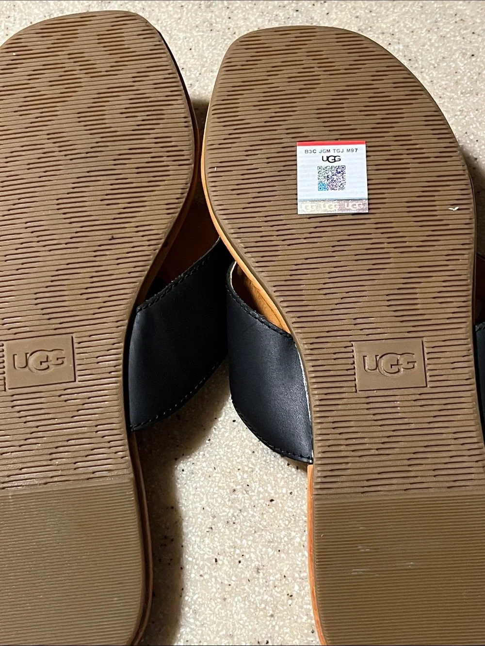 UGG Women’s Black and Tan Leather Toe-Post Sandals